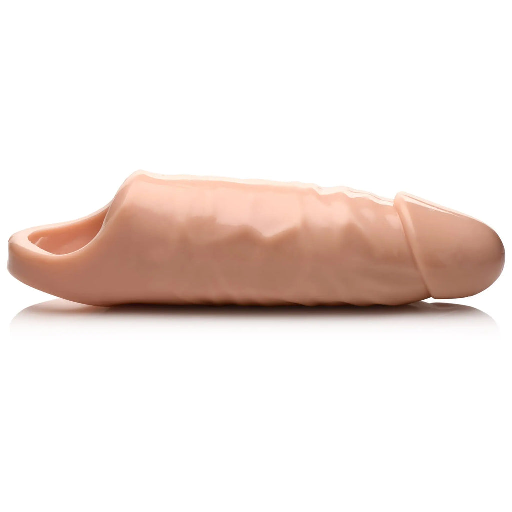 Size Matters 7-inch penis extension in a realistic flesh-toned silicone, featuring a textured shaft and open base.