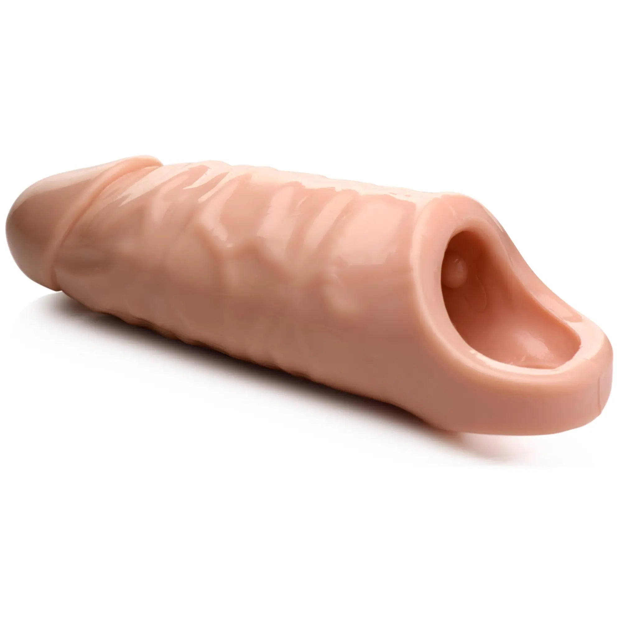 Size Matters 7-inch flesh-colored silicone penis extension with a realistic, textured shaft and open base.