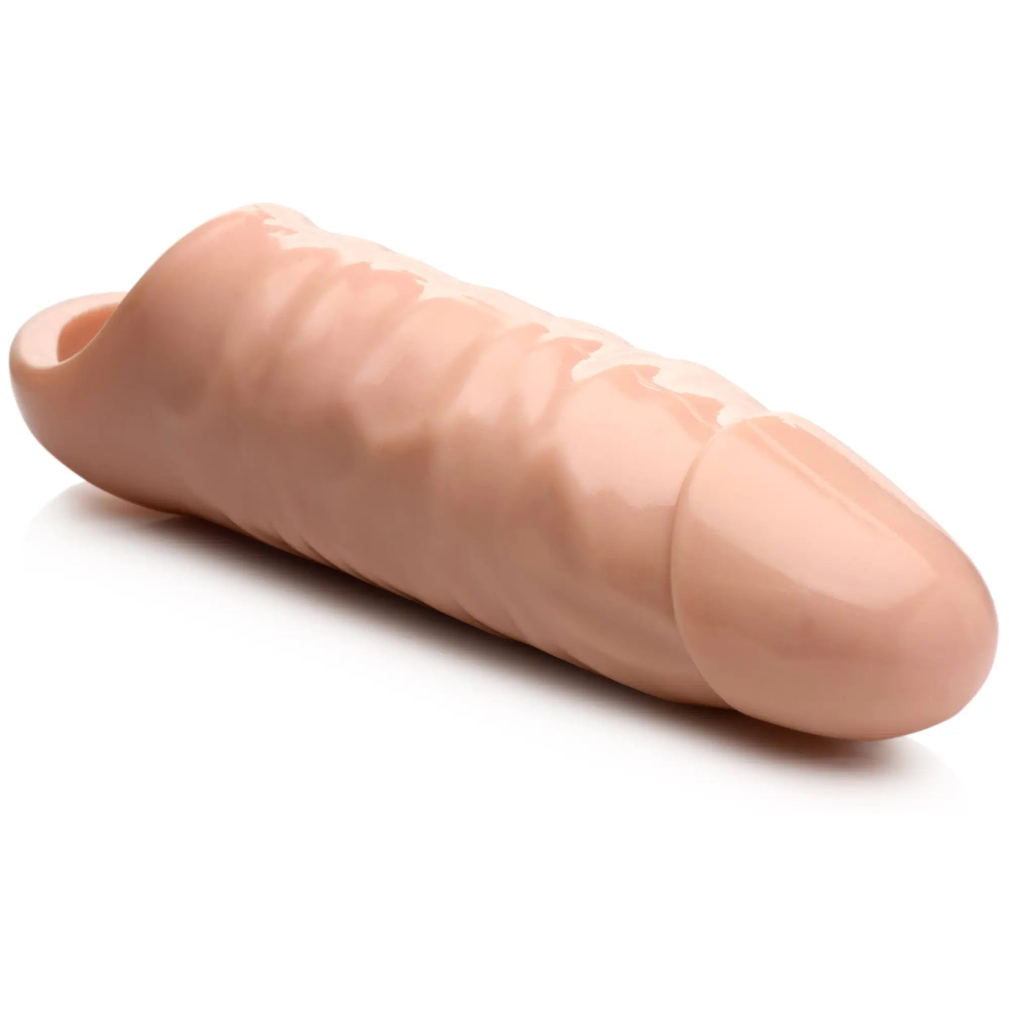 Size Matters 7-inch penis extension: a realistic, flesh-toned silicone sleeve with a textured, phallic design.