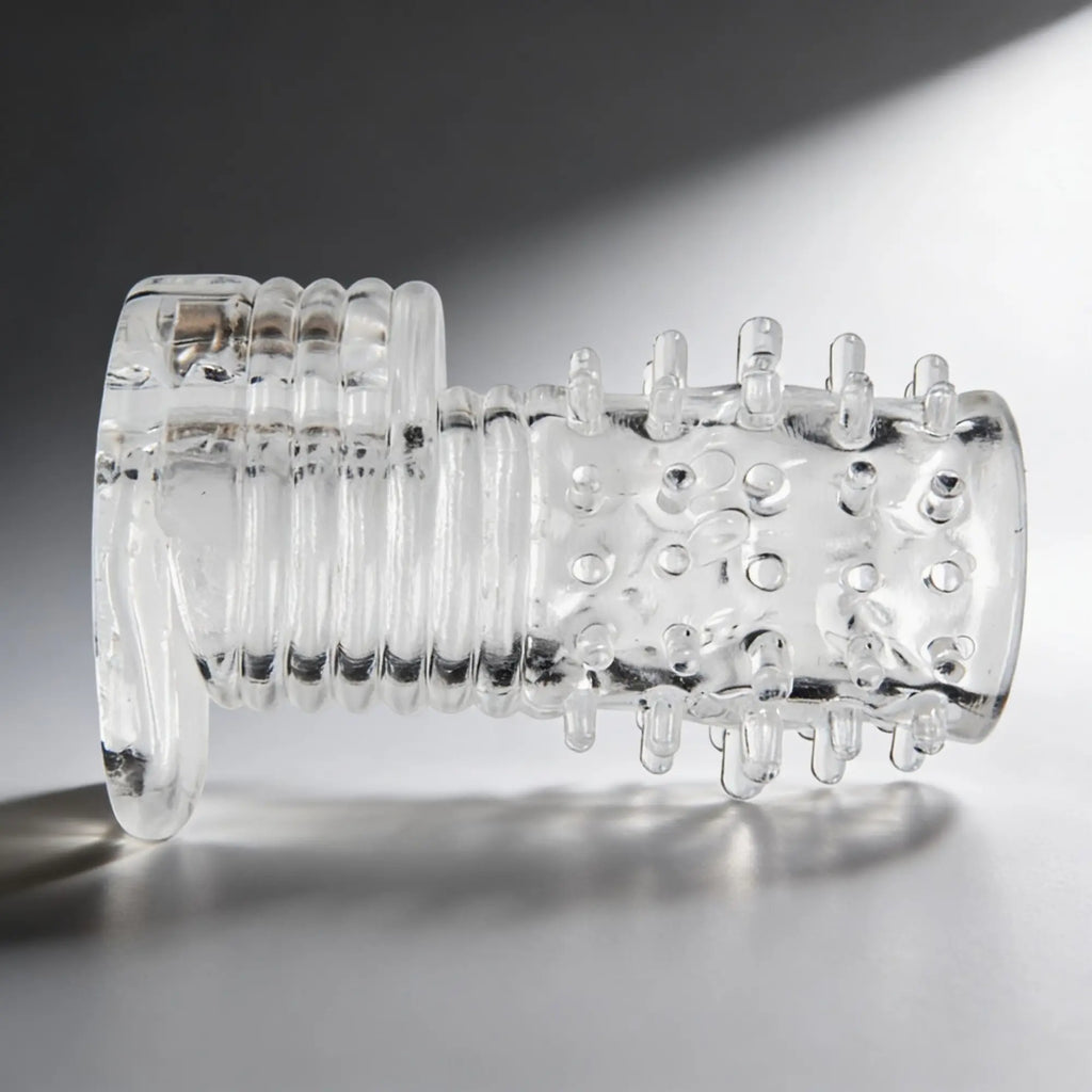 Size Matters Clear Sensations vibrating erection sleeve: a transparent, ribbed, and studded silicone textured sleeve.