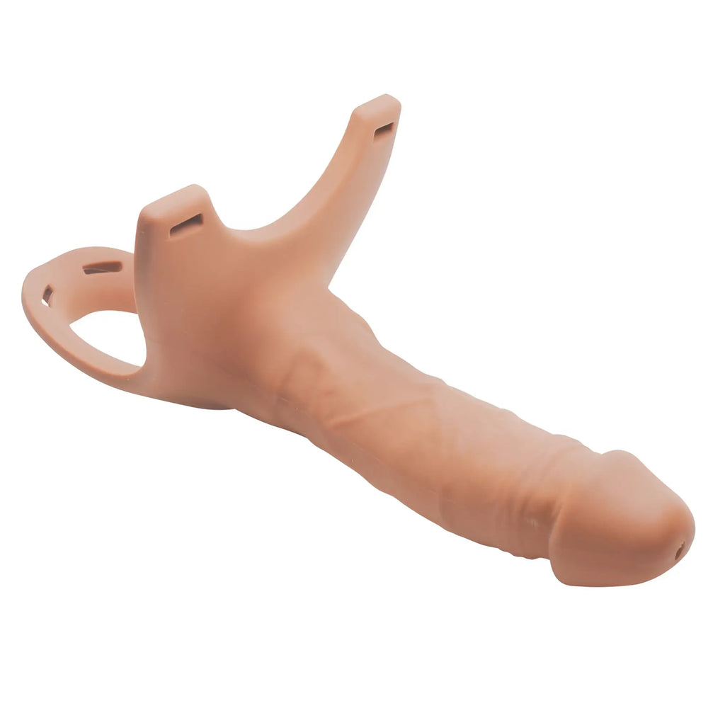 Size Matters hollow silicone strap-on dildo in a realistic tan skin tone with a harness-compatible base.