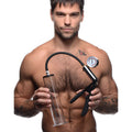 Size Matters Penis Pump Kit with 2-inch clear graduated cylinder, black hand pump, and analog pressure gauge.