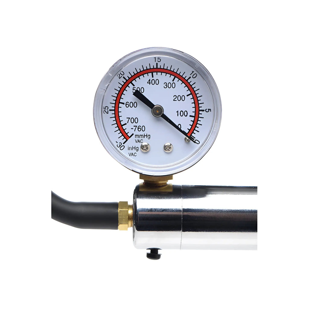 Size Matters Penis Pump Kit: A close-up of a silver metal cylinder with a circular analog pressure gauge attached.