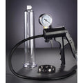 Size Matters Premium Penis Pump Set with a clear cylinder, black hand-pump, pressure gauge, and a black stud wristband.