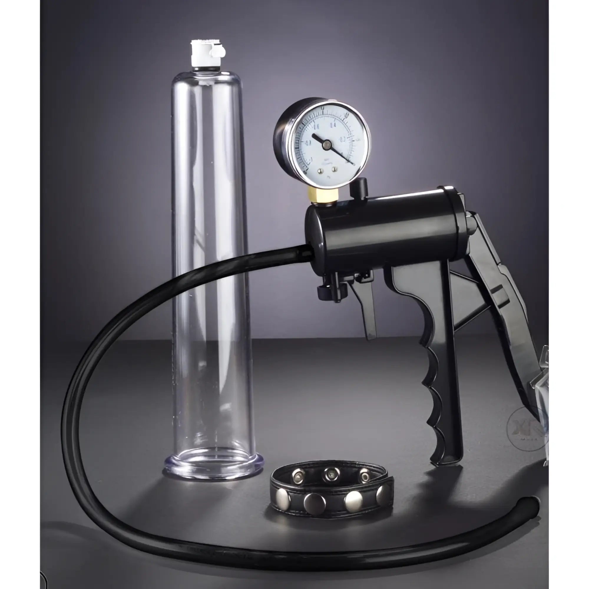 Size Matters Premium Penis Pump Set with a clear cylinder, black hand-pump, pressure gauge, and a black stud wristband.