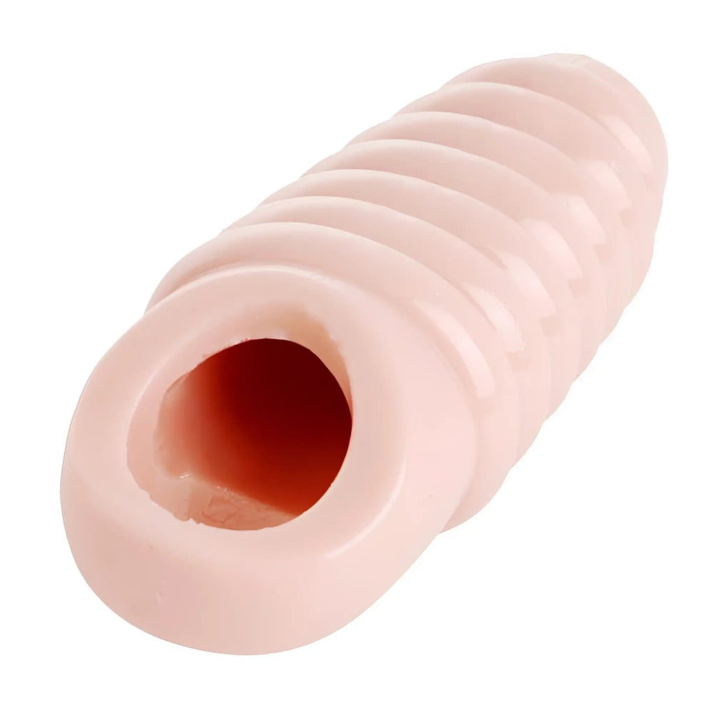 Size Matters Ribbed Penis Enhancer Sheath: A light pink, hollow, cylindrical sleeve with prominent circular ridges.
