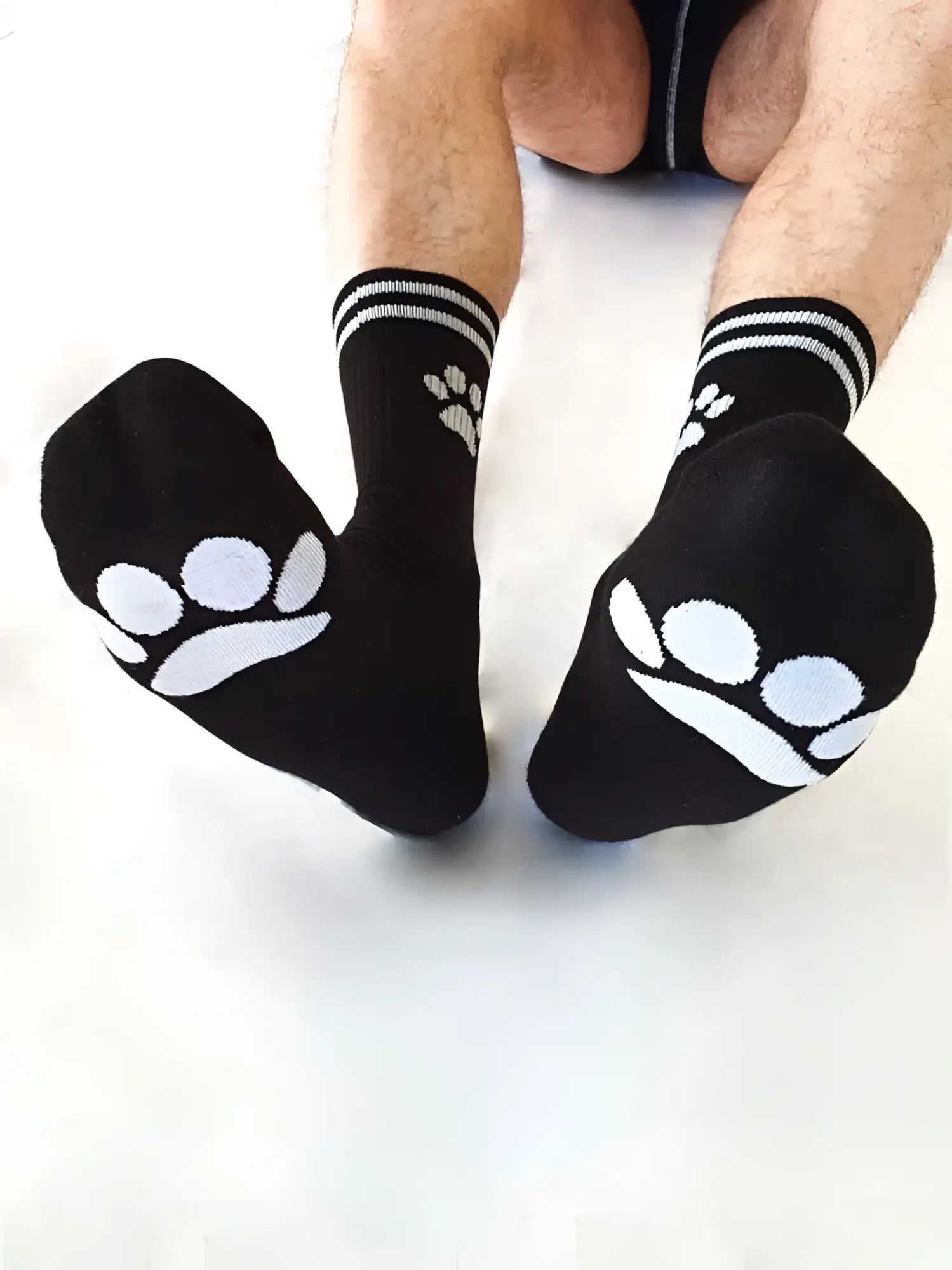 Sk8erboy puppy socks black size 39-42 with white paw prints on toes and striped cuffs made of soft fabric