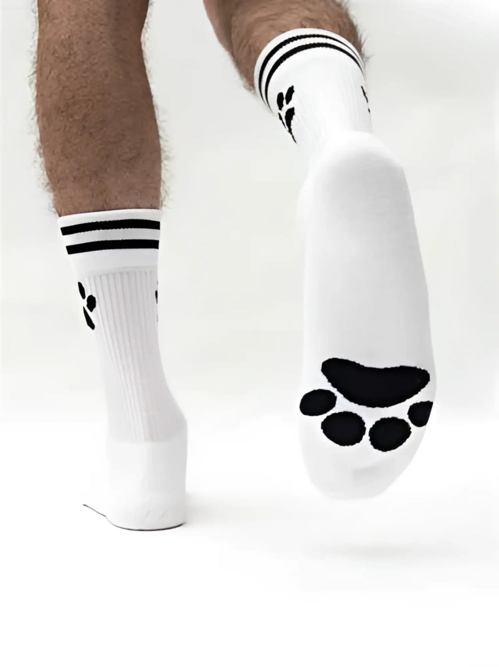 White sk8erboy puppy athletic socks size 39-42 with black paw prints and striped cuffs