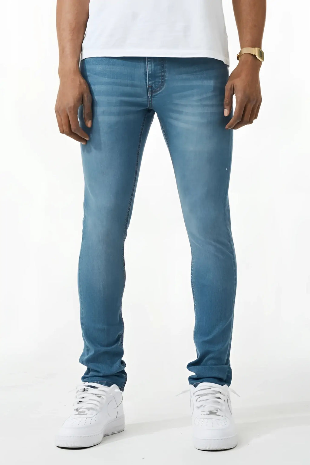 Blue slim fit denim jeans with subtle fading made of durable material for a stylish skinny fit look