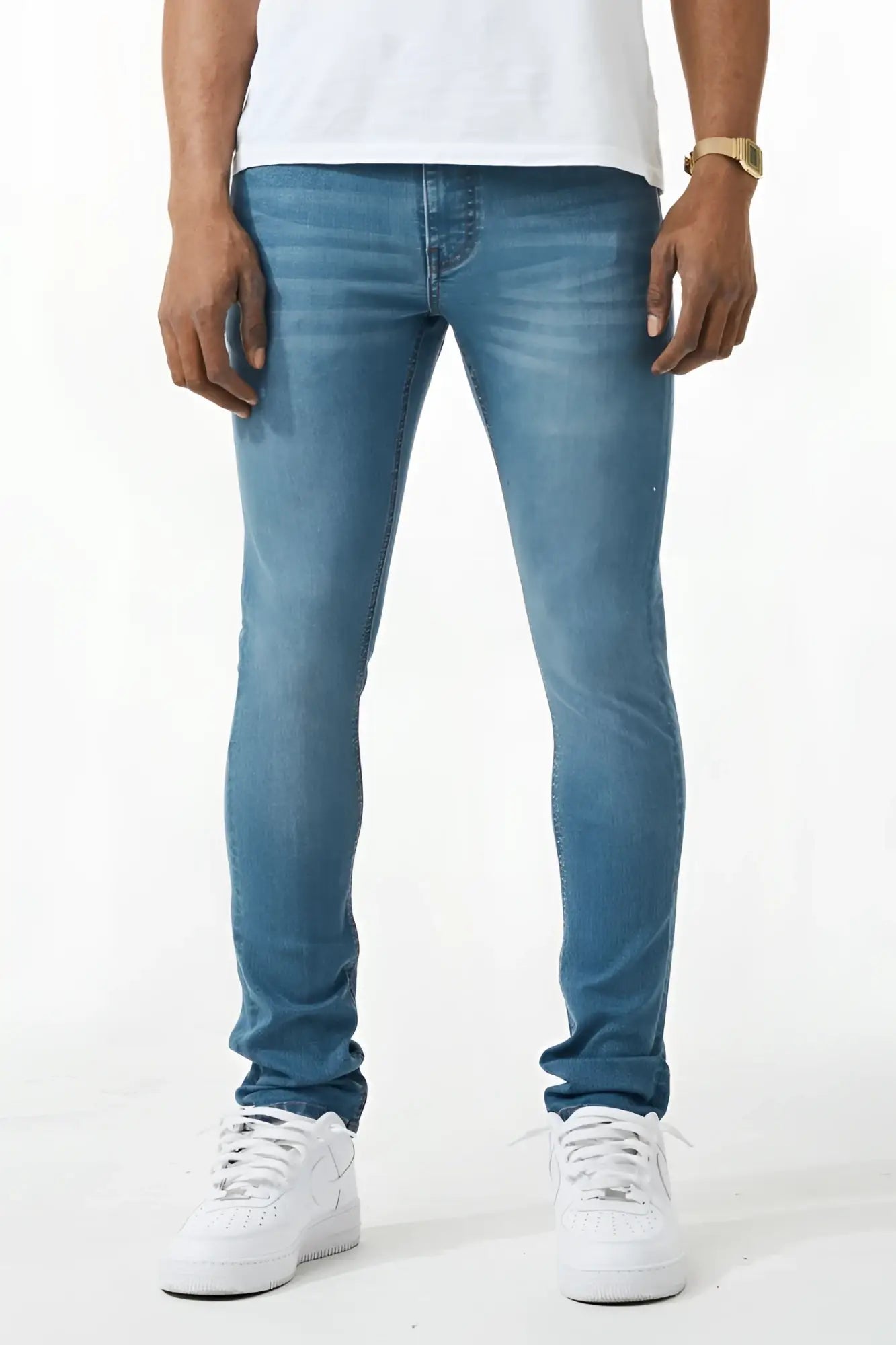 Blue slim fit denim jeans with subtle fading made of durable material for a stylish skinny fit look
