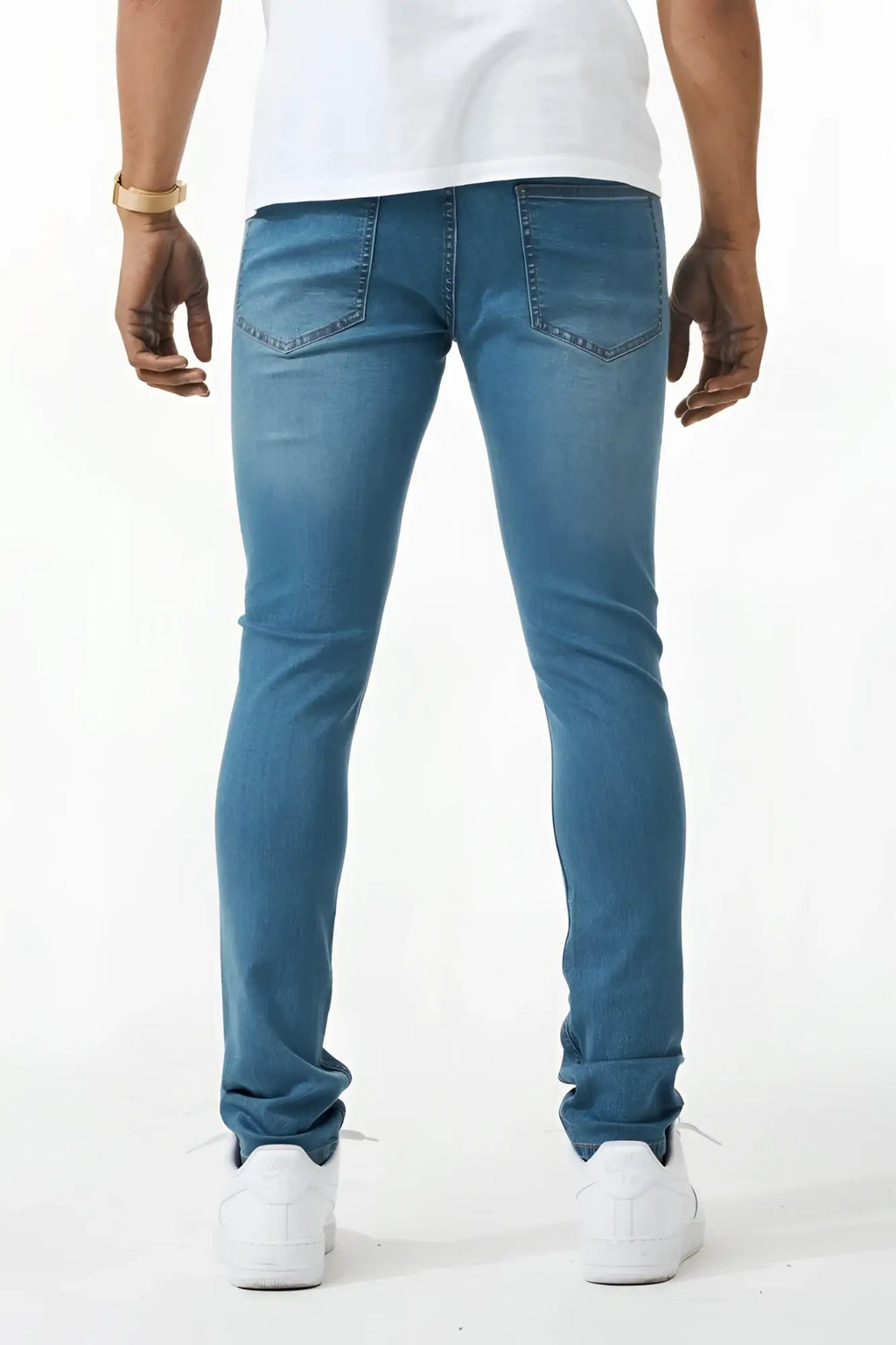 Blue skinny fit denim jeans with classic five-pocket design in slim-fit style made from denim material