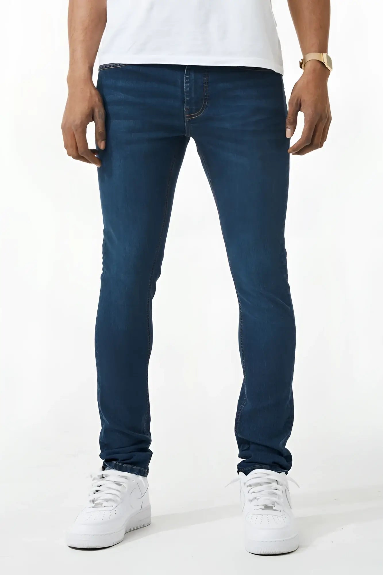 Skinny fit denim jeans in dark blue slim-fit with classic five-pocket design and subtle thigh fading