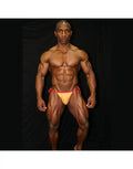 Arroyman men's sling bikini in orange and red featuring a minimal design and adjustable side ties modeled by a muscular man.