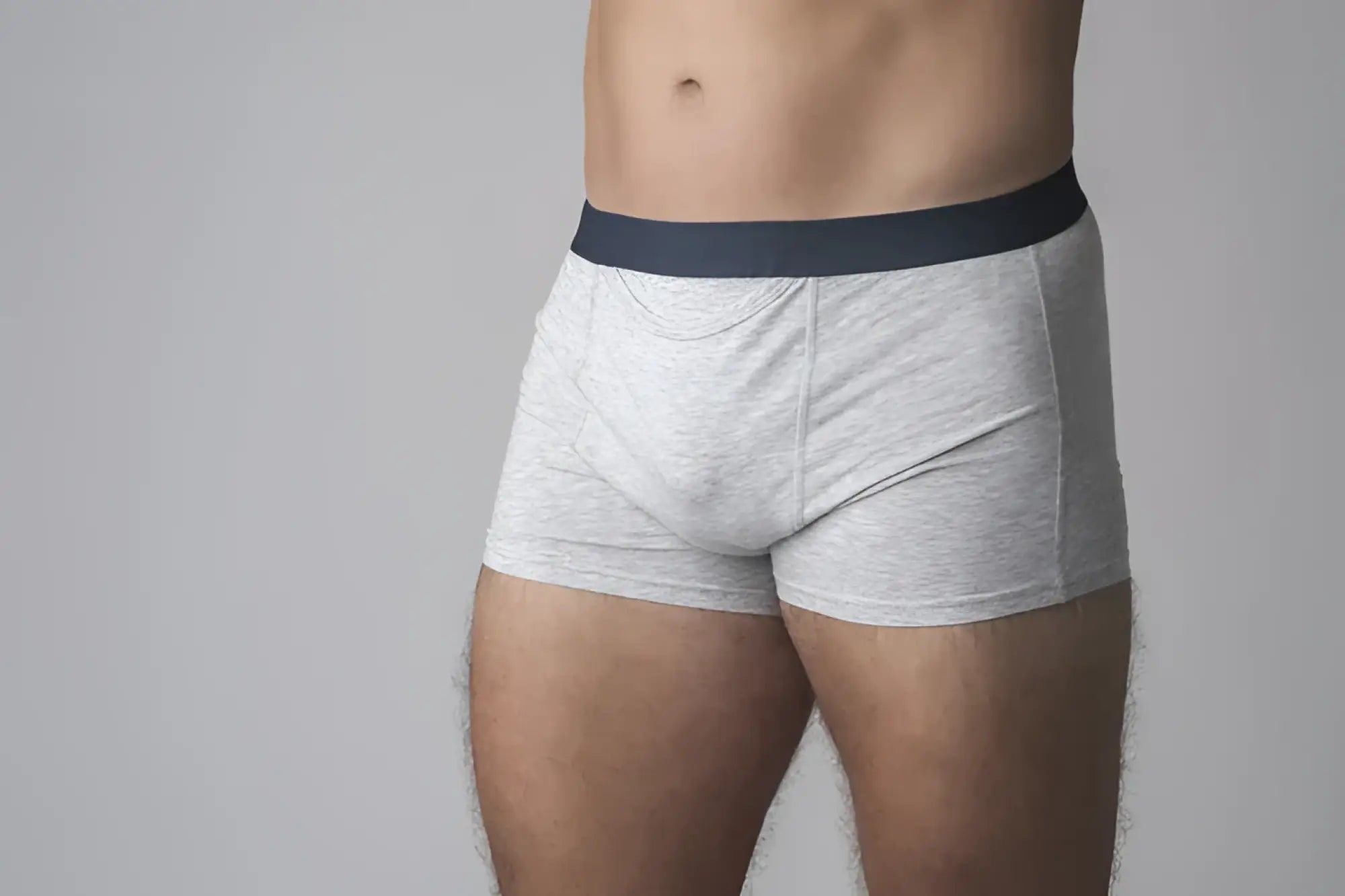 Gray heathered boxer briefs with a solid navy waistband from snowballs underwear made of soft breathable fabric