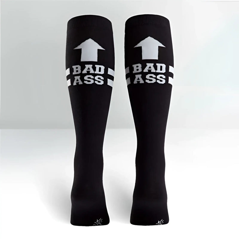Sock it to me bad ass knee high socks in black with white arrow and text above two stripes size medium