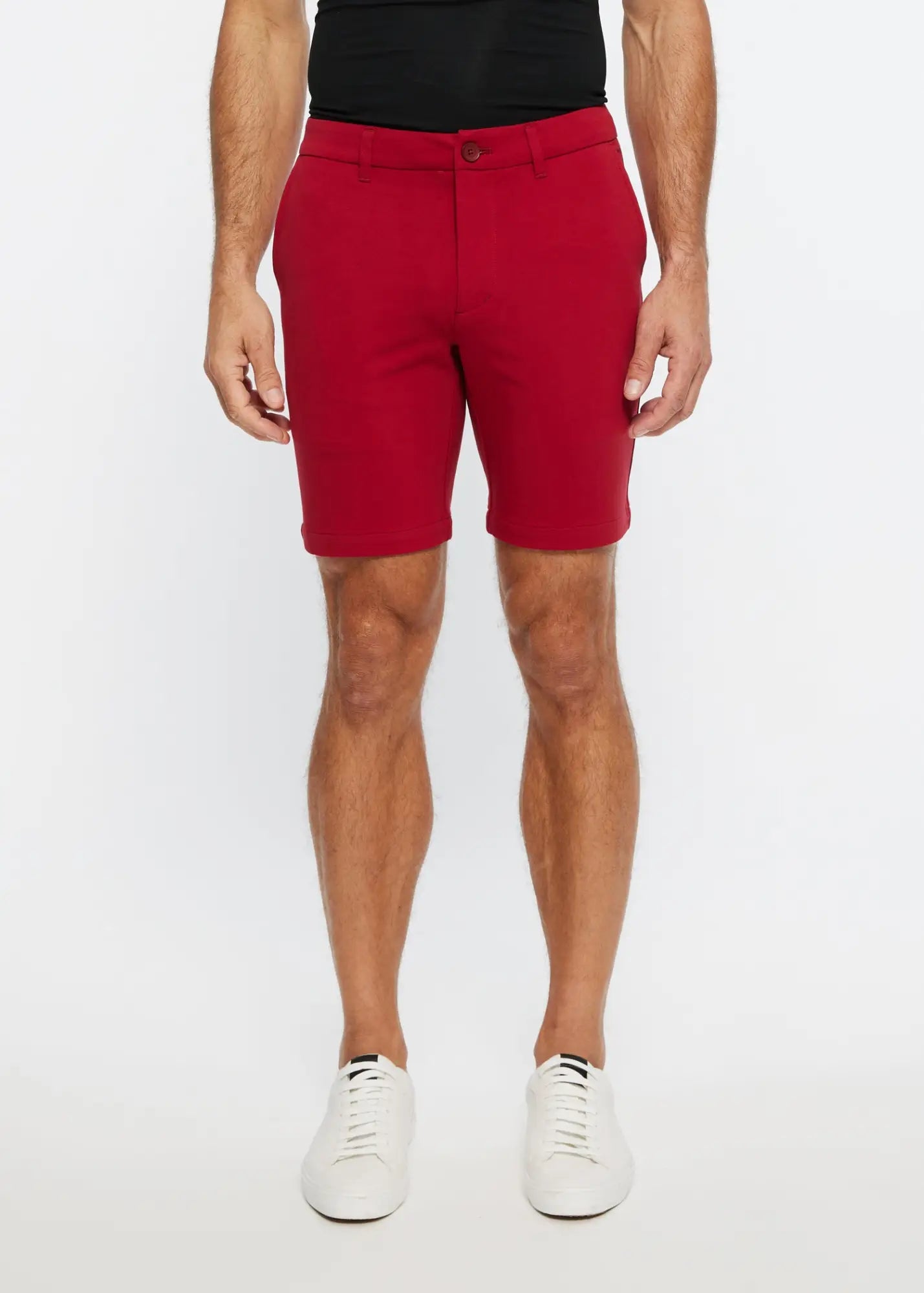 Red men’s solid stretch knit chino shorts with tailored fit and button closure ideal for casual wear