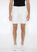 White solid stretch knit shorts with a tailored fit and subtle side pockets for comfortable casual wear