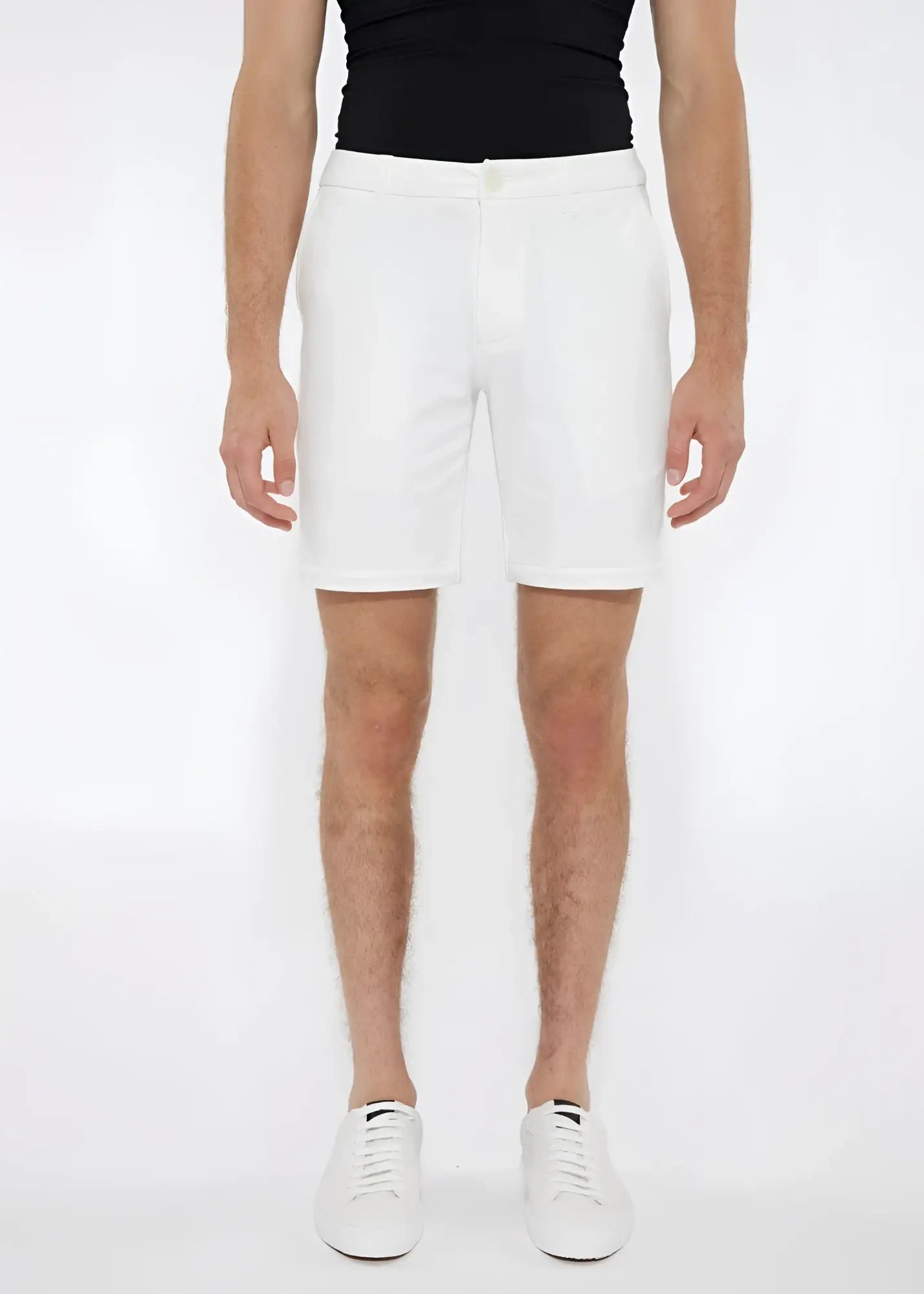 White solid stretch knit shorts with a tailored fit and subtle side pockets for comfortable casual wear