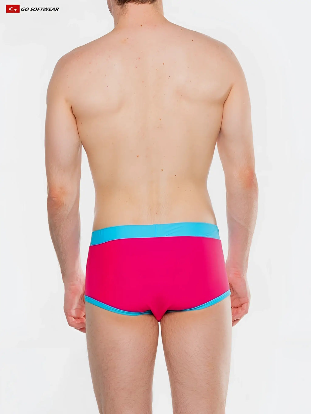 Bright pink splash full-cut brief swim trunks with turquoise waistband and trim for comfortable beach use