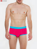 Bright pink splash full-cut brief swim with turquoise waistband and trim made of smooth fabric finish