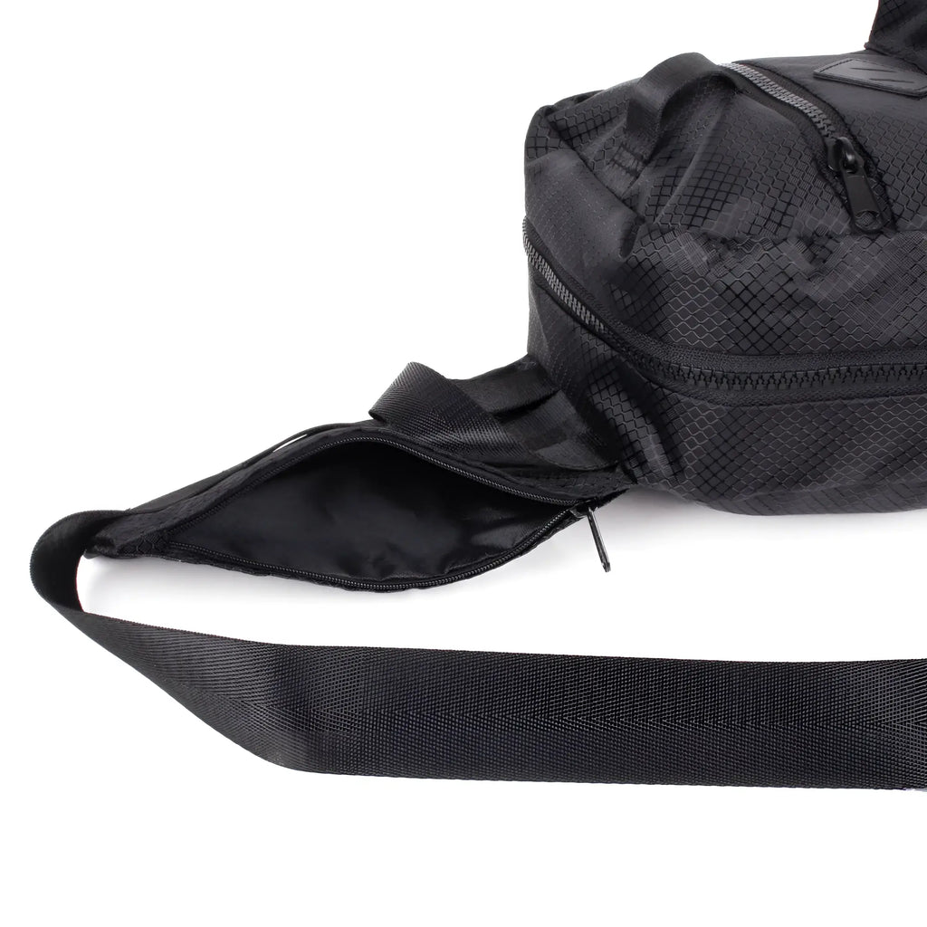 Black sport crossbody sling bag with mesh pattern wide adjustable strap and multiple zippered compartments