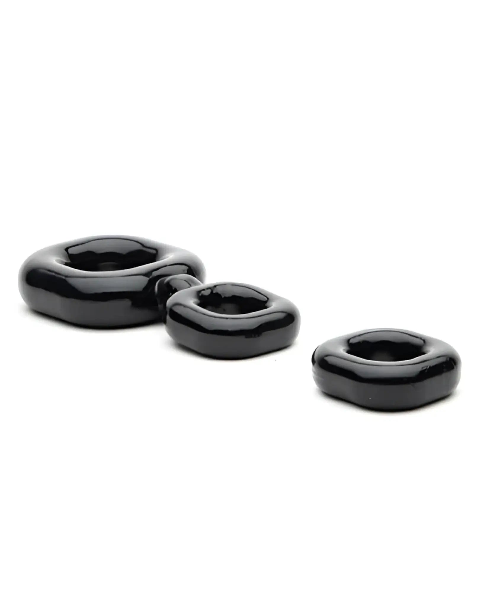 Set of three black glossy silicone ring inserts from sport fucker boner kit for enhanced performance and comfort