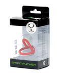 Red silicone sport fucker cum stopper in clear plastic packaging with black and green branding