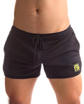 Black mesh sport fucker jersey short m with drawstring waistband and neon green logo patch on lower right leg