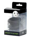 Black silicone muscle ball stretcher in clear packaging with green sport fucker branding visible on the front
