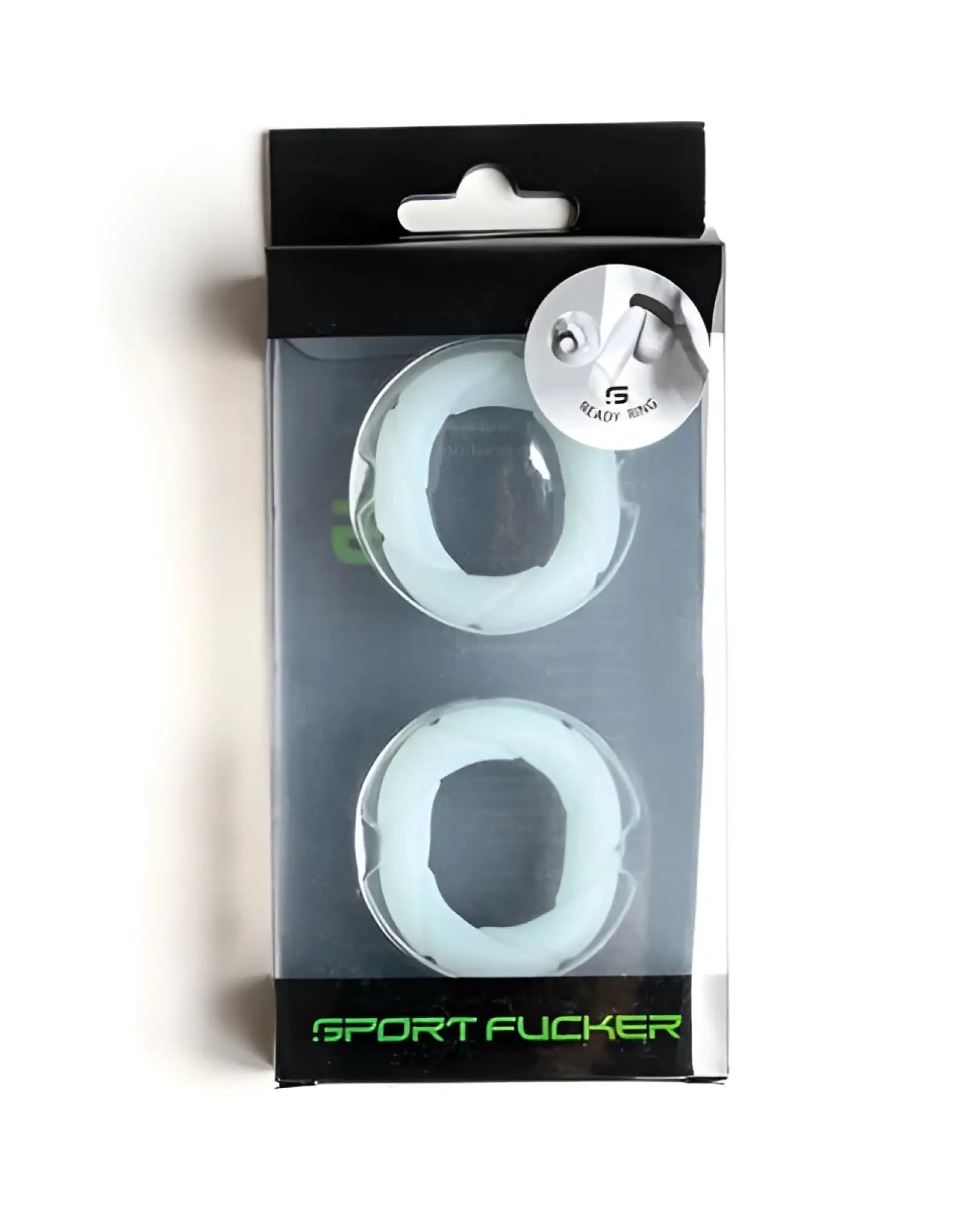 Two translucent white silicone sport rings in black and clear packaging labeled sport fucker glow in the dark
