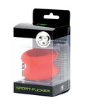 Red silicone muscle ball stretcher in black and clear plastic package with green sport fucker branding