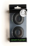 Black rubber sport fucker stacker rings in clear plastic package with green branding for sports grip use