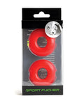 Red silicone sport flogger with circular design and black packaging from sport fucker stacker rings collection