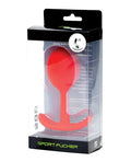 Red silicone sport fucker thunder plug medium in clear packaging with black and green branding visible