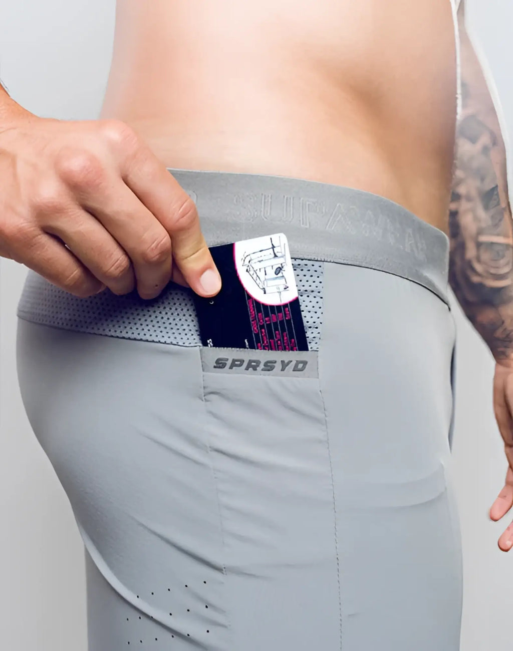 Gray spr flex short athletic briefs with mesh waistband and branded pocket for comfortable active wear