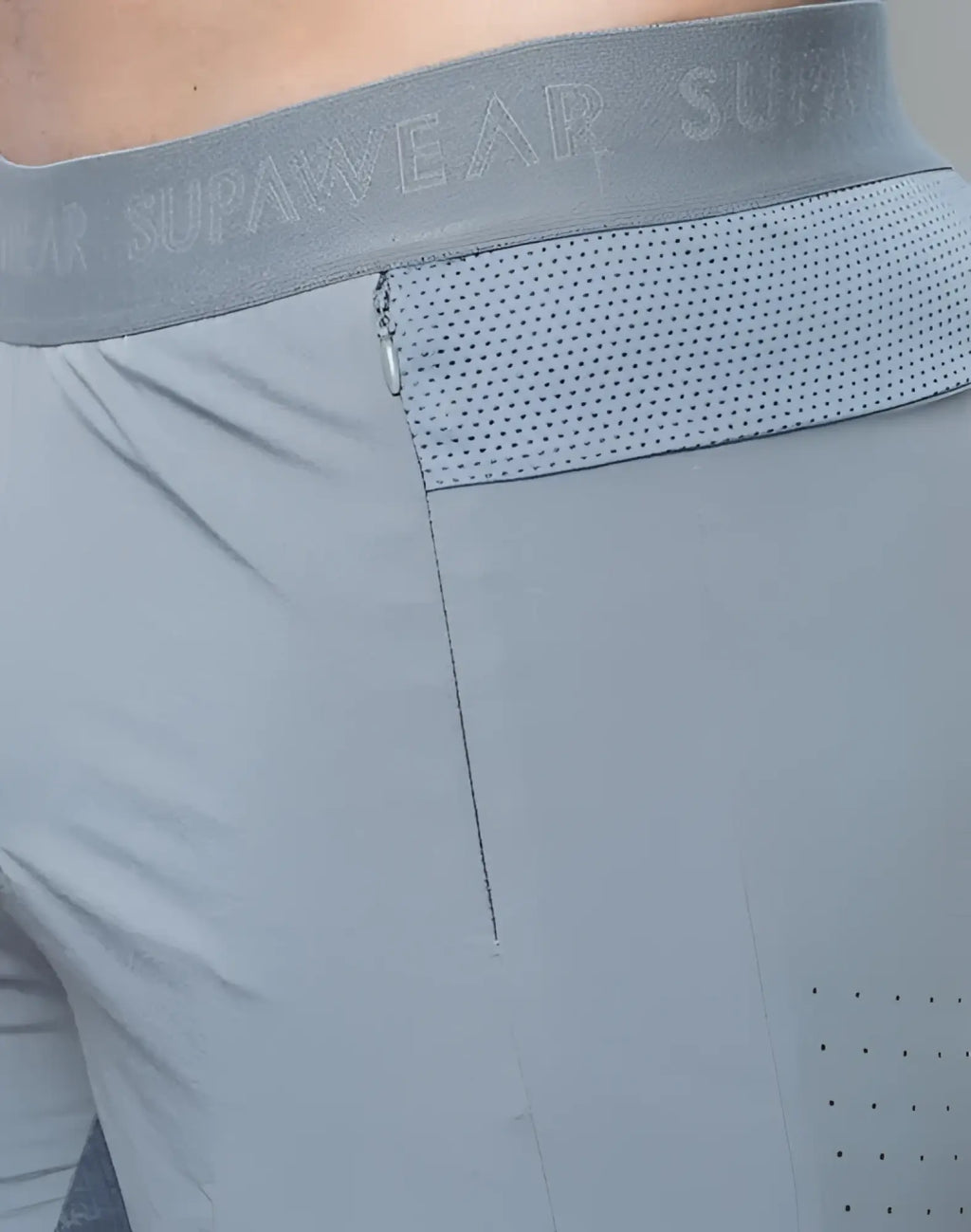 Gray spr flex shorts with perforated mesh panels and elastic waistband branded supawear for athletic use