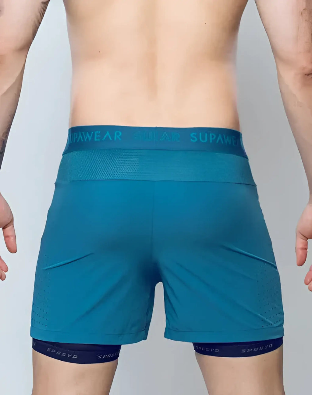 Teal spr flex short athletic shorts with mesh waistband and dark blue trim featuring supawear branding