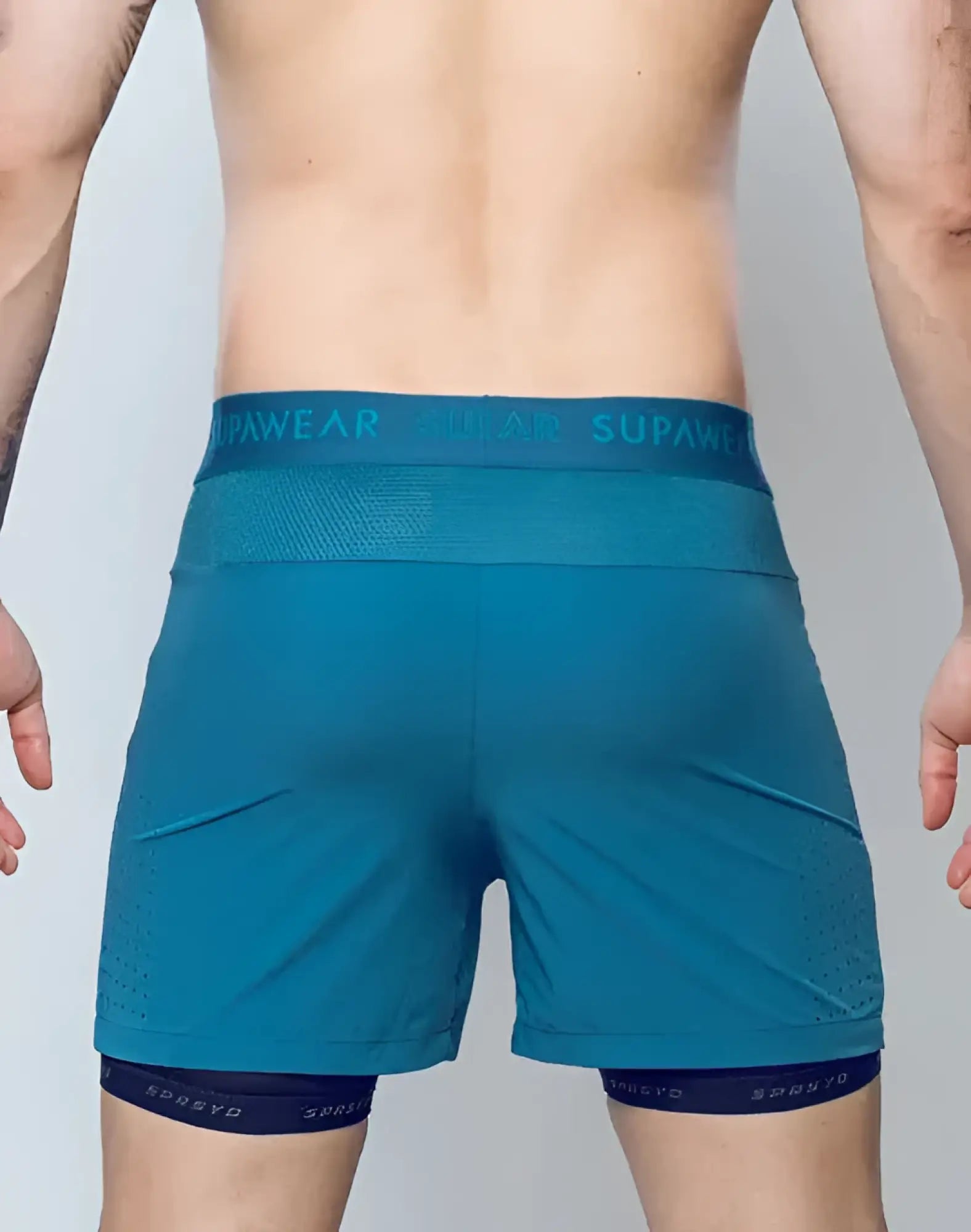 Teal spr flex short athletic shorts with mesh waistband and dark blue trim featuring supawear branding