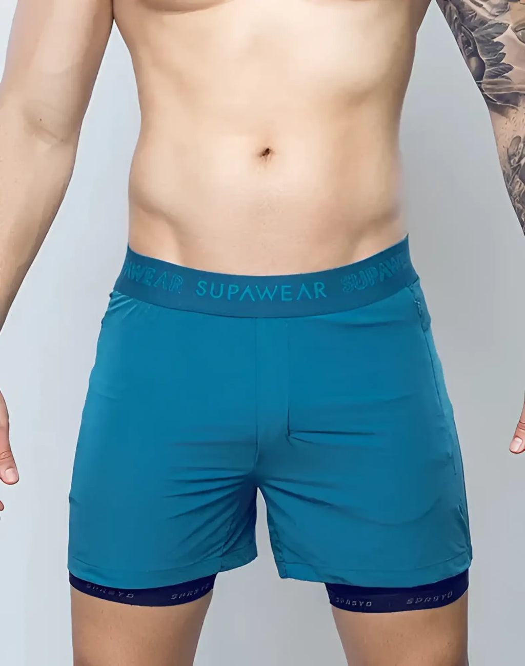 Teal SPR FLEX SHORT supawear athletic shorts with matching elastic waistband and dark blue inner lining