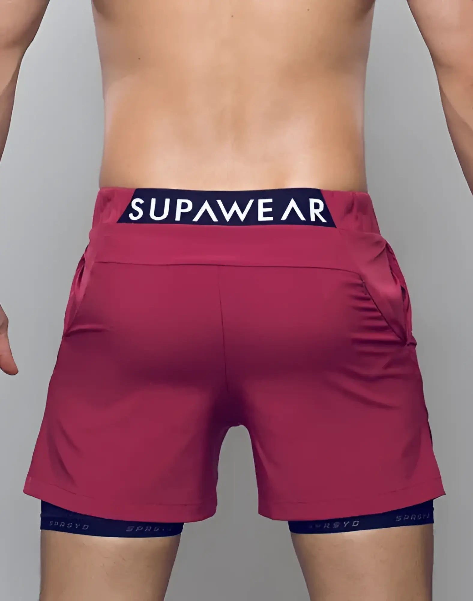Spr max short vibrant red athletic shorts with navy blue supawear waistband and matching inner compression shorts