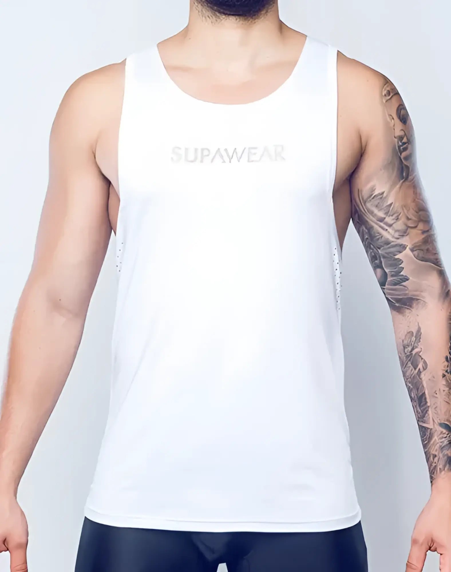 White supawear spr y tank top with subtle mesh detailing on the sides for breathability and style
