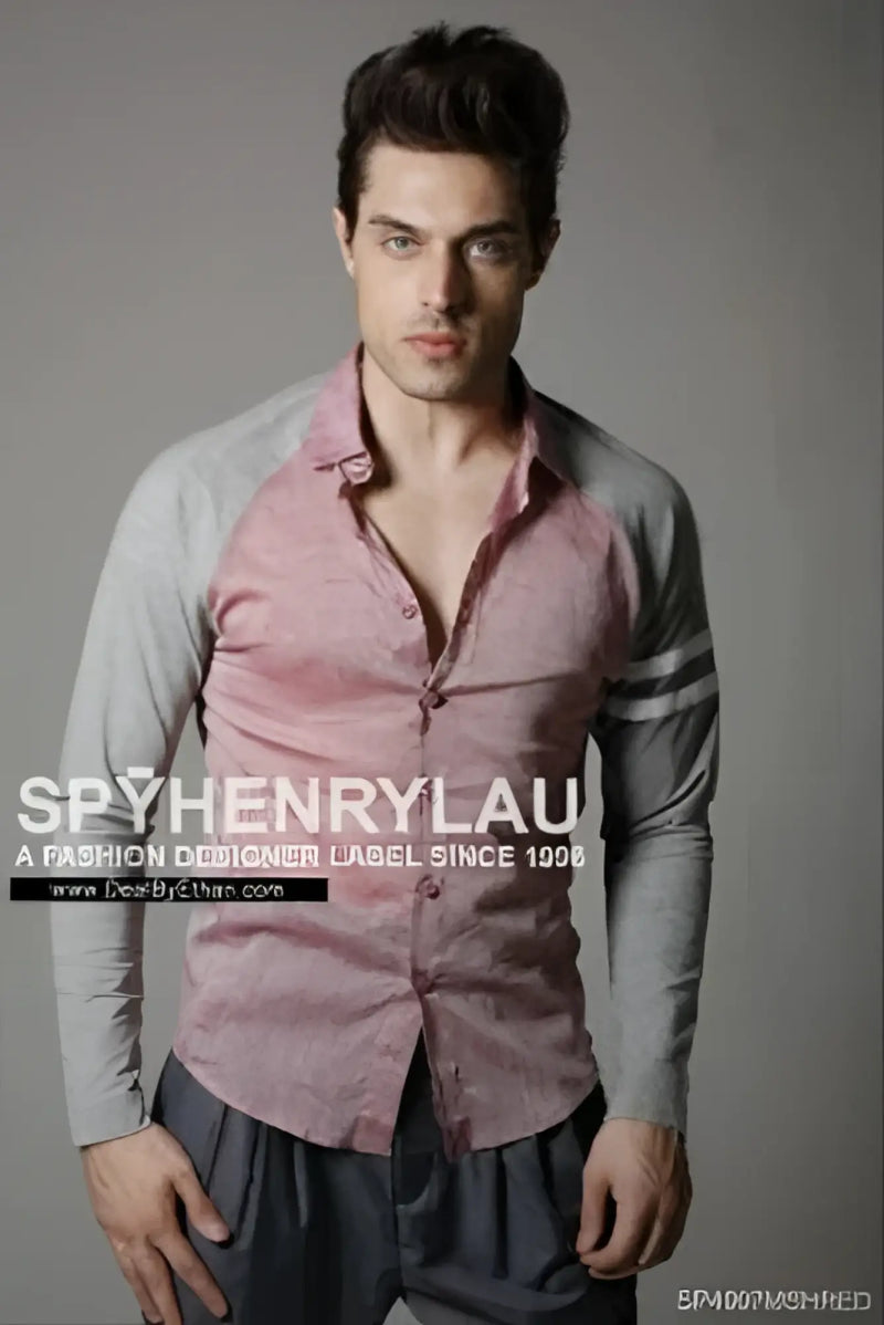 A man wearing a spy henry lau slim fit contrast panel long sleeved shirt in pink and gray panels size L