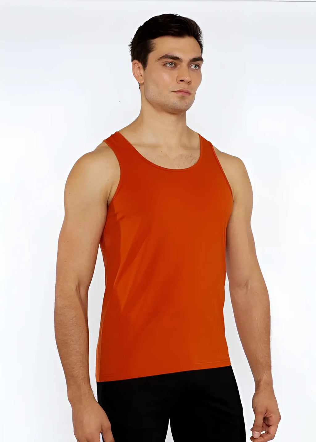 Orange sleeveless athletic tank top made of stretch jersey with circle spine laser cut for active wear