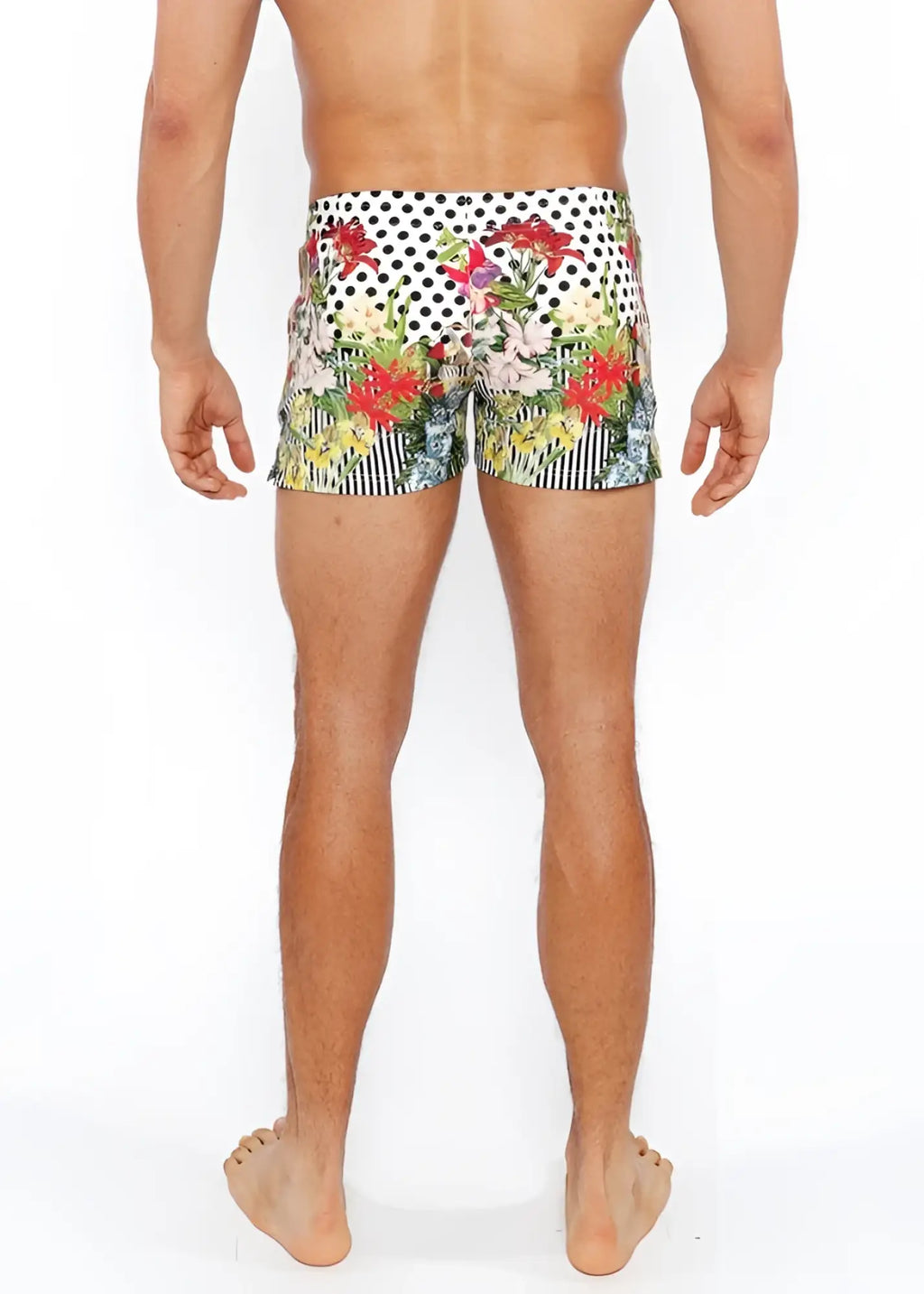 Dots abstract printed swim shorts featuring vibrant floral and polka-dot patterns in red pink green and yellow on white