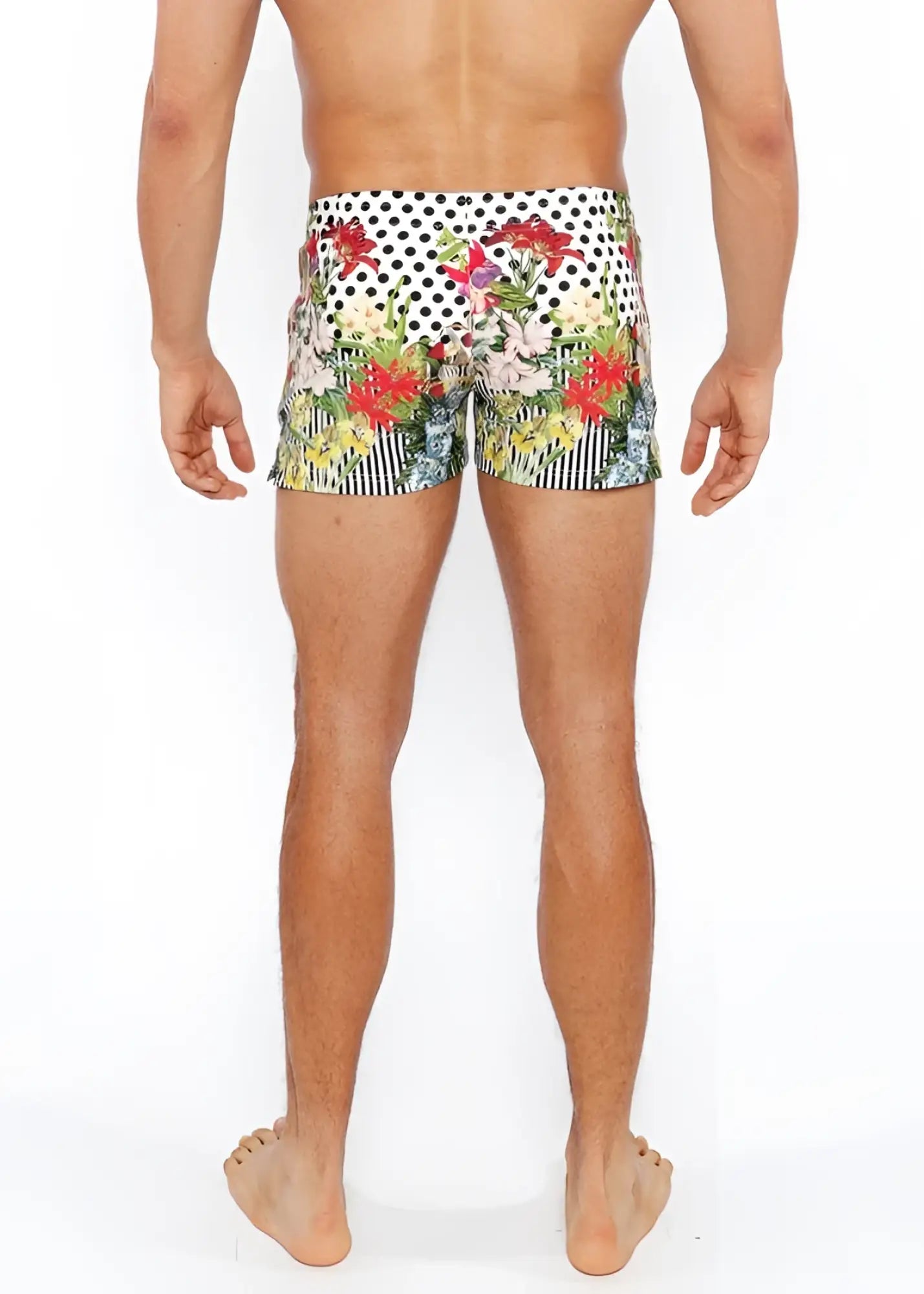 Dots abstract printed swim shorts featuring vibrant floral and polka-dot patterns in red pink green and yellow on white