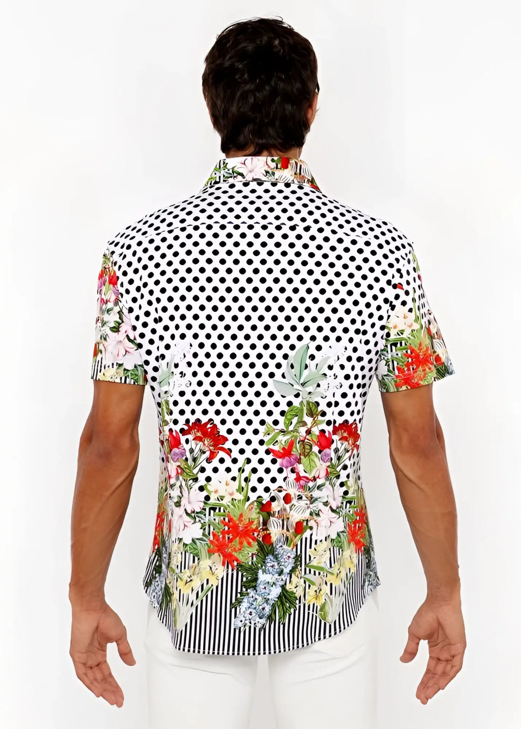 A vibrant short-sleeved men’s modal shirt with bold black and white polka dots and colorful floral border prints
