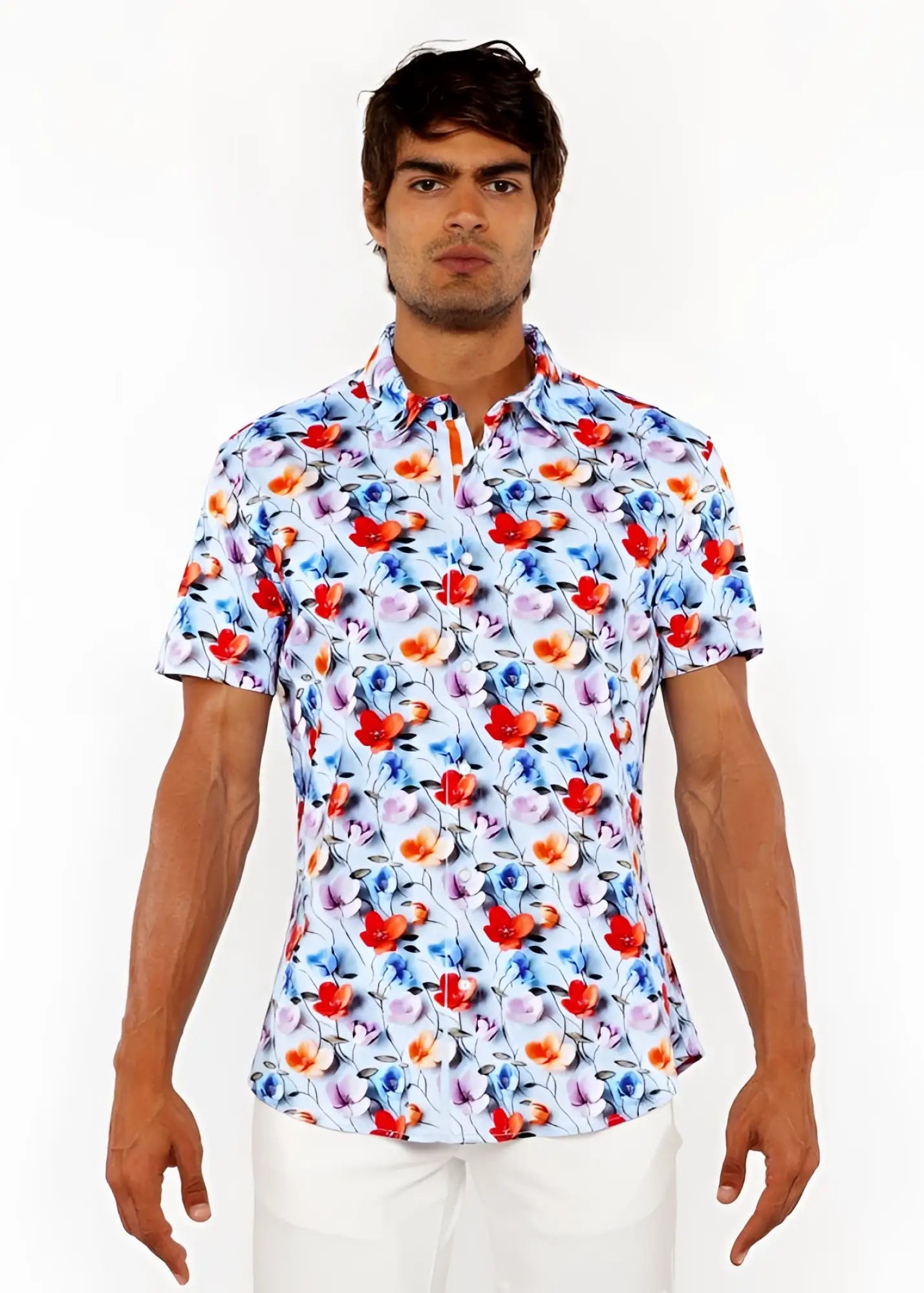 A floral 3d print stretch knit shirt in white with vibrant red blue and pink blossoms and short sleeves
