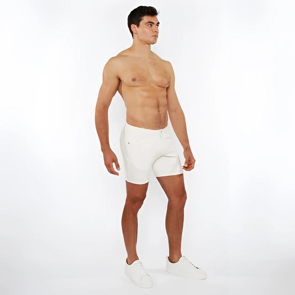 White jacquard stretch knit chino shorts with a clean minimalist design made from breathable fabric for athletic use