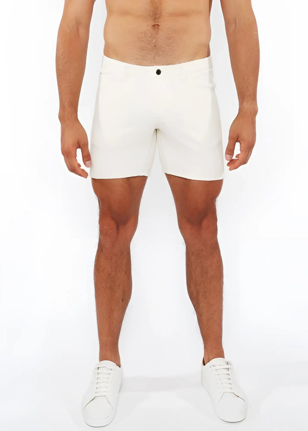 White jacquard stretch knit chino shorts with a sleek form-fitting design and a black button at the waistband