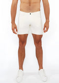 White jacquard stretch knit chino shorts with a sleek form-fitting design and a black button at the waistband